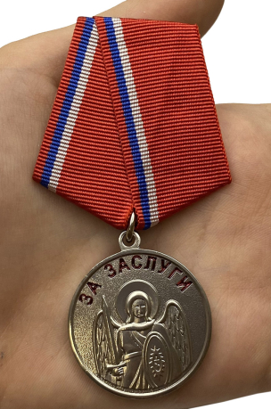 Казачья медаль "За заслуги" - вид на ладони
