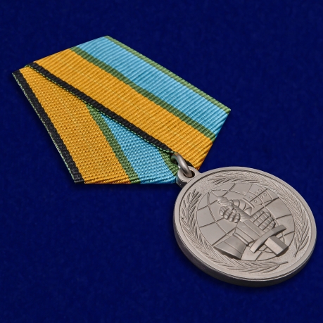 Латунная медаль МО РФ За вклад в развитие международного военного сотрудничества - общий вид