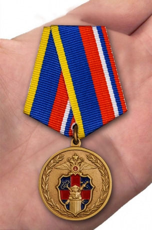 Медаль 100 лет Службе тыла МВД России -на ладони