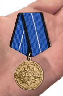 Медаль Спецстроя За безупречную службу 1 степени - вид на ладони