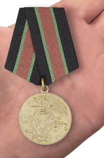 Медаль "Участнику контртеррористической операции" - вид на ладони