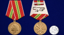 Медаль В память 300-летия Санкт-Петербурга - сравнительный размер