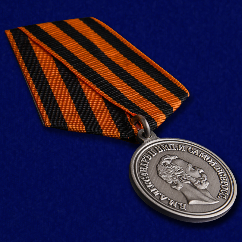 Внешний вид награды Александра II "За храбрость" с колодкой (георгиевская лента)