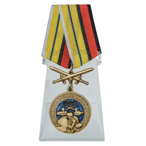 Медаль "За службу в артиллерийской разведке" с мечами на подставке