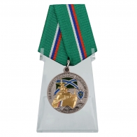 Медаль За службу в береговой охране на подставке