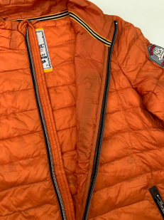 Оранжевая мужская куртка от Caterpillay