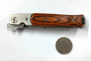 Складной нож-стилет с деревянной накладкой на рукояти